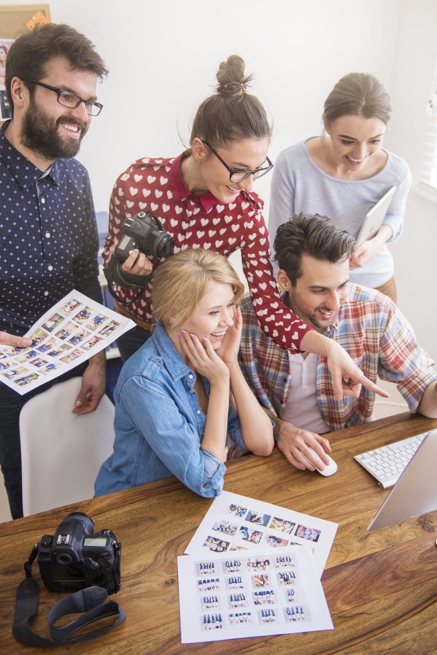 - in-office - coworkers at office with photo cameras and computer scaled - ui/ux